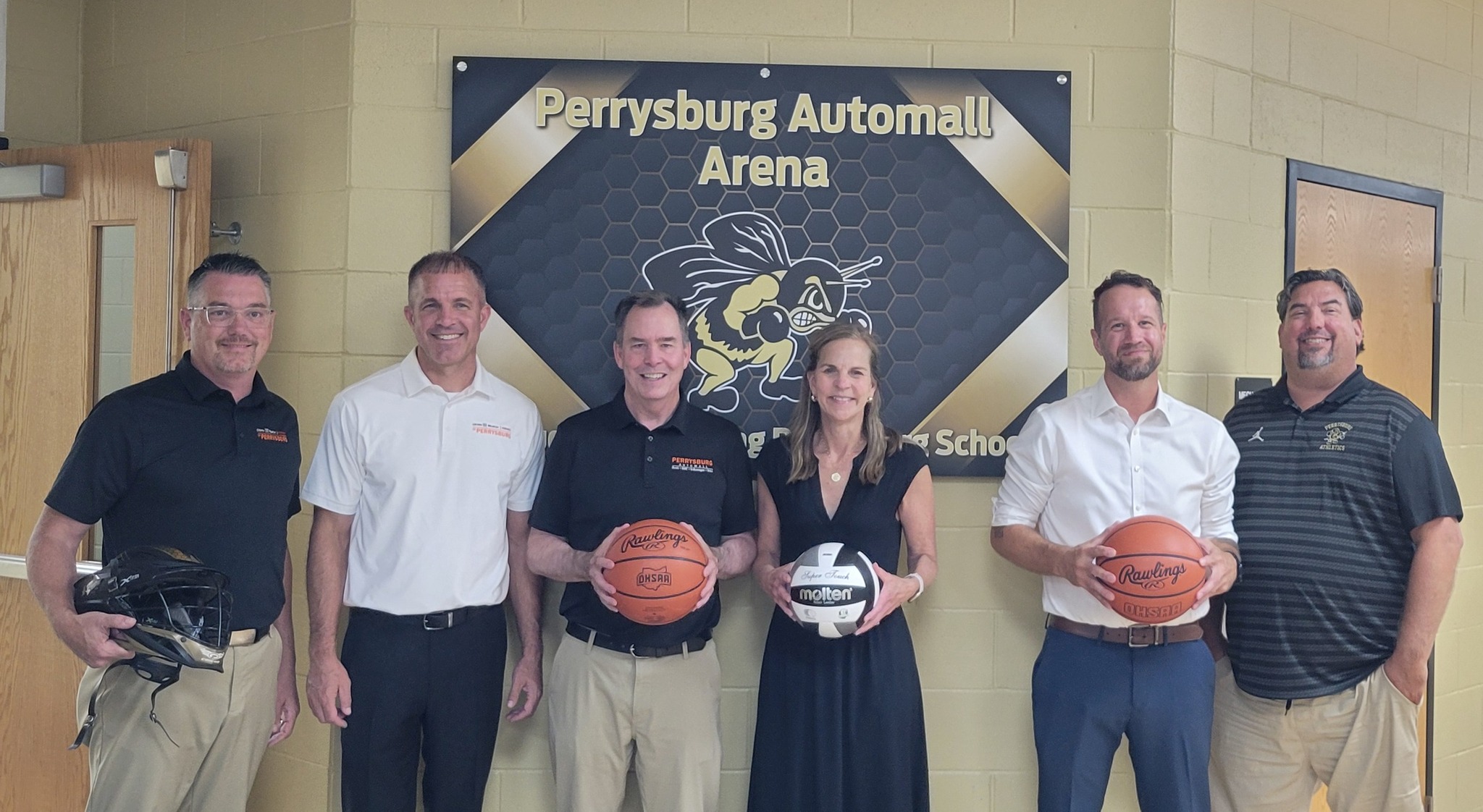 L-R: Justin Miller – Commercial Truck Manager, Matt Cunningham – Buick/GMC General Manager, Connie Cronin – Controller, Richard Cronin – President, Ryan Ort – Perrysburg Automall General Manager, Chuck Jaco, Perrysburg High School Athletic Director